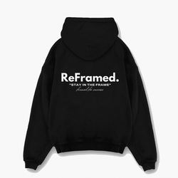 “Reframed ‘Framed for Success’ hoodie: A black hoodie featuring a stylish frame design, perfect for those striving for success. Available now on our Shopify store.”